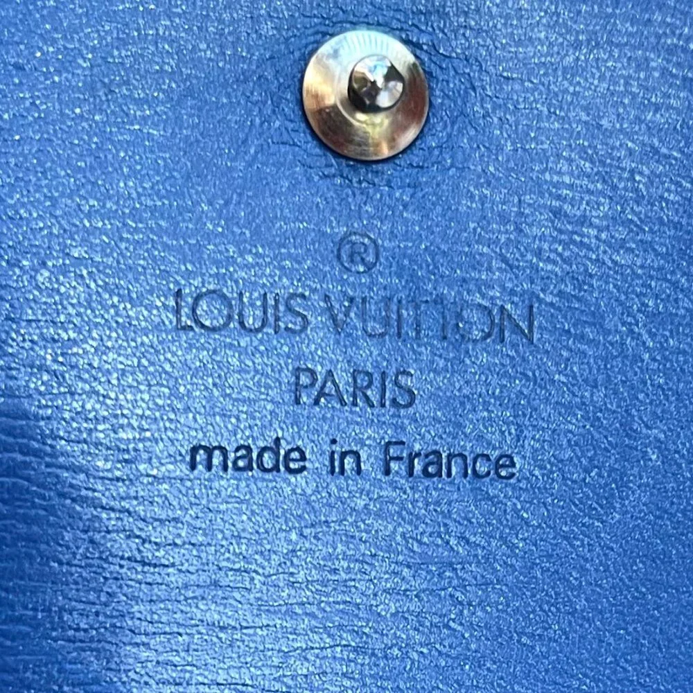 Auc Louis Vuitton blue Epi leather classic wallet w double button snap closure